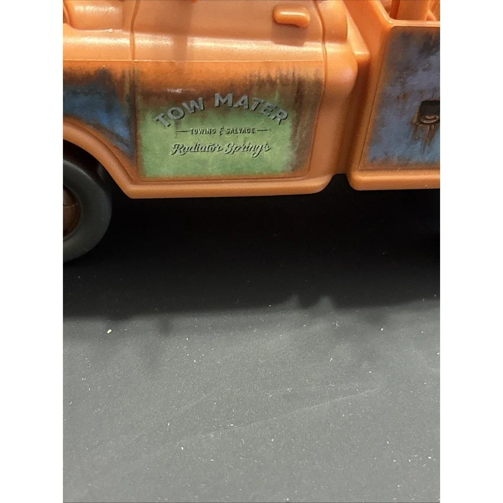 Disney Pixar Cars Lot - Mack Transforming Playset Hauler & Moving Moments Mater
